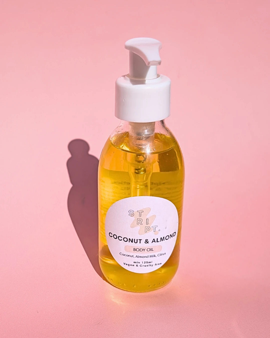 Juicy Body Oil by Stript Cosmetics | Handmade, Vegan Body Care | Glass bottle with white label and white pump